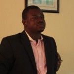 Obafemi Bamidele, standing while the compere reads his citation, shortly before presenting